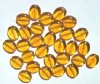 30 12mm Transparent Topaz Flat Oval Bead